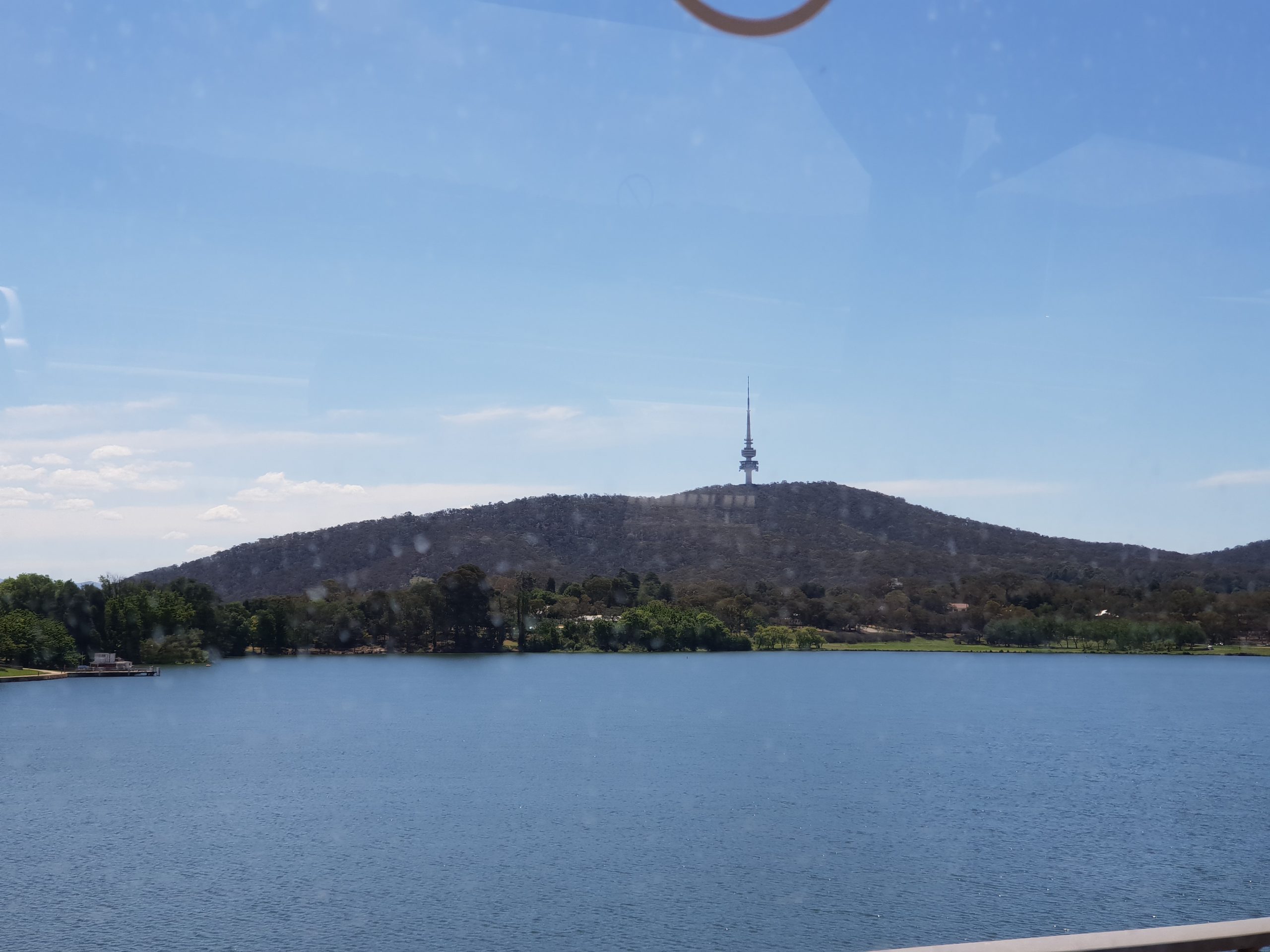 Picture shows Telstra Tower in Canberra behind Lake Burley Griffin.