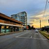 Image shows Alto apartments at Charlestown NSW, and Charlestown Road, a car can be seen in the left lane pulling up to the pedestrian crossing between Hilltop Plaza and Service NSW building. also near Matara Hotel.